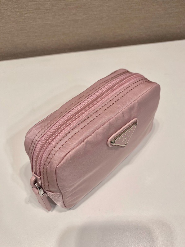 Pra*a clutch bags